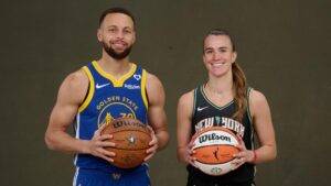 Stephen Curry in Warriors uniform and Sabrina Ionescu in Liberty uniform doing media for the 3 point contest